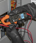 Digital Clamp Meter Workhorse With 400A Auto-Ranging Clamp, AC/DC Voltage, TRMS, in use during electrical panel testing
