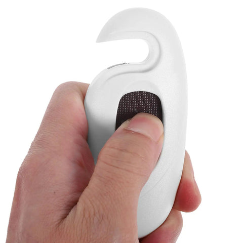 Close-up of a hand holding a white safety lock device, showcasing a double-button design for Kid Proof Cabinet And Fridge Locks.