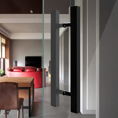 Push Pull Door Handle for Glass, Wood, and Barn Doors Black Lacquered Stainless Steel installed on glass door in modern room