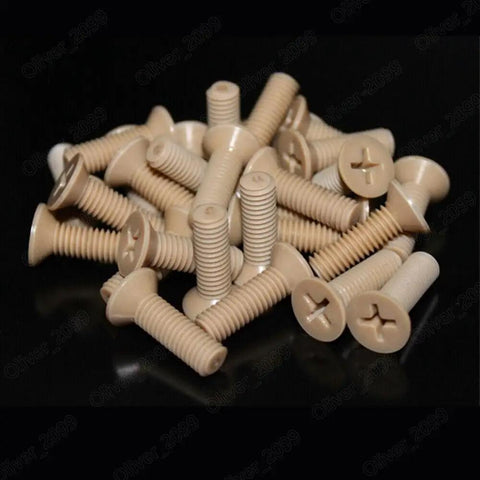Top Shelf PEEK Plastic Phillips Countersunk Flat Head Screws M1.2 Through M8 heavy duty polymer fasteners on a black background.
