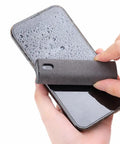 Using a 2 Pack Car And Device Screen Cleaner Spray And Wipe 2 In 1 Touchscreen Mist Cleaner for iPhone with microfiber pad, streak-free cleaning.