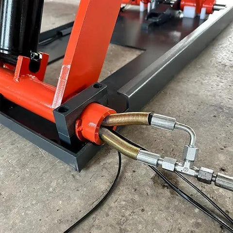 Close-up of hydraulic connections on Mid Rise Electric Scissor Lift 110V Featuring Rapid Drop And Dead Simple Controls.