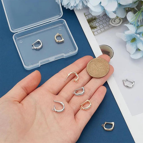 8Pcs 18K Gold Plated Necklace Shortener Clasp Brass Enhancer Set With Cubic Zirconia on hand, showing gold and silver clasps