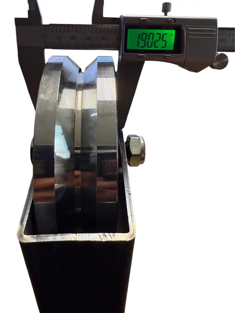 Close-up of 6 In Chrome Plated Steel V Groove Wheel With Box Mount featuring a precision measurement of its axle.