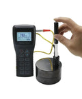 Portable Digital Hardness Tester Meter For Metal Materials Plug And Play Operation displaying readings on steel sample.