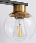 Close-up of globe glass shade on Black Gold 5 Light Vanity Light Fixture With Globe Glass Shades Over Mirror Wall Sconce E26 Base