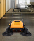 Industrial Push Broom Walker With Dual Steel Handles And Roomy Hopper slays leaves and debris on concrete driveways with efficient cleanup.