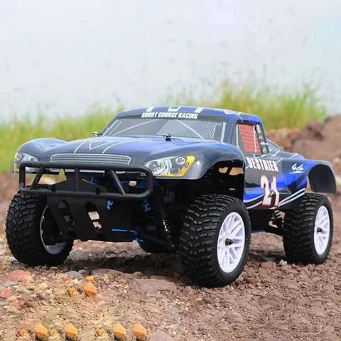 1 To 10 Scale Nitro RC Truck 4WD Off Road Beast For Adults Two Speed Remote Control Car With Methanol Fuel Power Igniter Short Course Buggy Rugged Climber For High Adrenaline Fun, shown on rocky terrain.