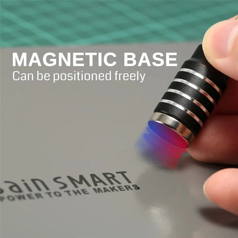 Close-up of finger positioning a magnetic arm on Magnetic Helping Hands Soldering Station With Large 11.1x7.1 Inch Base.