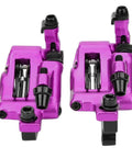 Heavy Duty Hydraulic Disc Brake Set Built Different With Reinforced Aluminum Calipers Delivers Buttery Smooth Stopping Action Fast To Install For Mountain Road And Electric Bikes showing pink aluminum calipers.