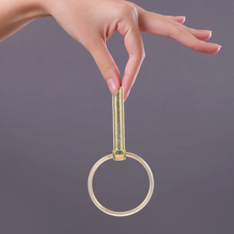 Close-up of hand holding Heavy Duty Galvanized Lynch Pin With Ring Set 16 Pack Industrial Pin Fastener Kit For Farm Tractors Trailers Trucks