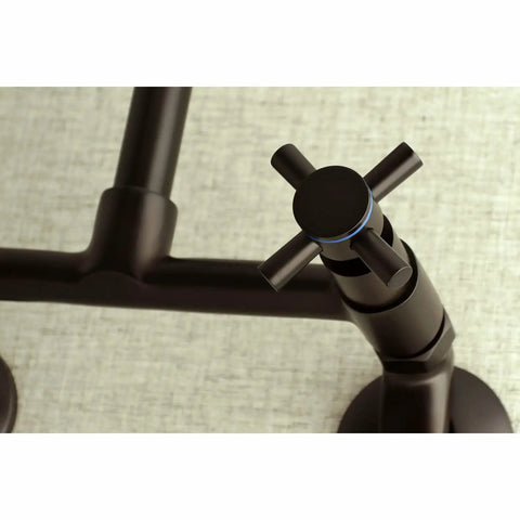 Close-up of Oil Rubbed Bronze 8-Inch Adjustable Center Wall Mount Kitchen Faucet handle, solid brass, modern design