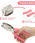 Heart And Star One Quarter Inch Metal Handheld Paper Punch Set with soft handled design held by hand, stainless steel and silicone grips visible