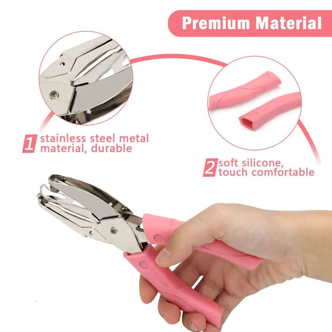 Heart And Star One Quarter Inch Metal Handheld Paper Punch Set with soft handled design held by hand, stainless steel and silicone grips visible