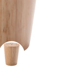 Close-up of a Solid As A Rock Adjustable Furniture Leveler Made From Rich Oak Wood, showcasing its smooth finish and sturdy design.