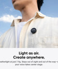 Man wearing wireless mic air transmitter for vlog streaming, ultralight 7.9g, seamless sync, on beige shirt outdoors