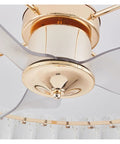 Close-up of the Top Shelf Modern Ceiling Fan Chandelier Combining Invisible Blades With Slick Crystal Accents And Warm Pendant Lighting.