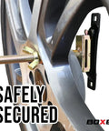 Close-up of Heavy Duty E Track Spare Tire Mount with 5 Inch Bolt Hanger installed on tire, spring-loaded grip visible