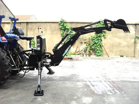Backhoe Attachment For Tractors With 3 Point Hitch Cat 1 PTO 15 Inch Bucket connected to a small tractor, side view