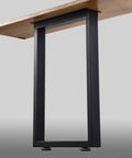 Beefy 30 Inch Metal Table Legs Set Of 2 With Adjustable Feet Pads Black Industrial Grade Support shown under wooden tabletop.