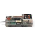 Side view of a Six Channel AS3X Plus and SAFE Telemetry Receiver for model aircraft with one wire telemetry, clear casing visible.
