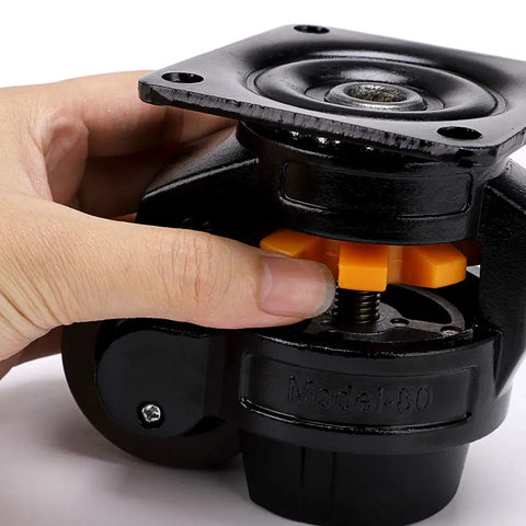 Beefy Heavy Duty Leveling Casters With Large Top Plate And Retractable NBR Pad being adjusted by hand for secure placement.