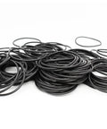 Awesome Black Nitrile O Ring Gasket Assortment Kit For Garage Hacks And Home Fixes Includes 2 Point 5 Millimeter Seals Built For Strong Vibration And Best For Plumbing And Auto Work To Stop Leaks Dead Without Spending Too Much Cash. black 2.5mm nitrile O-rings stacked on white background