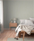 Grain Sack Stripe PVC Free Wallpaper Featuring Refined Linen Texture enhances a cozy bedroom with calming stripes.
