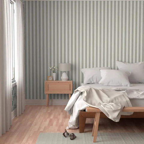 Grain Sack Stripe PVC Free Wallpaper Featuring Refined Linen Texture enhances a cozy bedroom with calming stripes.