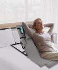 Heavy Duty Electric Adjustable Power Lifting Bed Backrest With Smooth Remote Control used by a woman relaxing in bed.