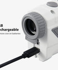 Close-up of Vpro Golf Rangefinder With Pinsensor And Flag Lock, 900 Yards Slope Laser, USB charging port connected