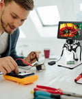 Man using 7 Inch Digital Microscope With Screen 1080P Live View 1200X Magnification 12MP Ultra Precise Focusing for inspection