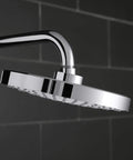 Awaken 8 Inch Single Function Rain Showerhead with Adjustable Swivel Ball Joint, Polished Chrome, side view in bathroom