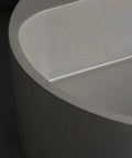 Close-up view of Top Tier Grey Terrazzo Round Vessel Sink 15.7 Inches above counter basin showcasing smooth, sealed surface.