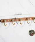 Rock Solid Wall Mounted Coat Rack With Five Heavy Duty Hooks And Natural Wood Base, size 42cm, holds coats and hats.