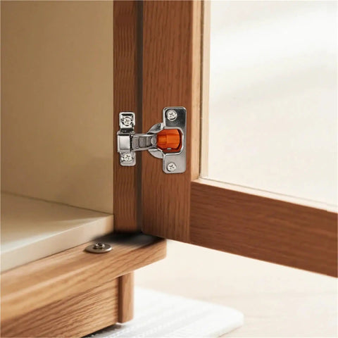 Concealed Soft Close Cabinet Hinges Featuring Short Throw Arms And Hydraulic Damping For Tight Furniture Frames Buttery Smooth Closure Zero Drama Black Pair Heavy Duty Hardware installed on wood cabinet.