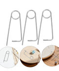 Heavy Duty Stainless Steel Brooch Cotter Safety Spring Pins For Quick Lock Farm Hitch And Industrial Use With Anti Vibration Stability, set of three, close-up view.
