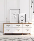 10 Pack Brushed Satin Nickel And Gold Cabinet Pulls With 5 Inch Hole Centers on a modern white dresser.