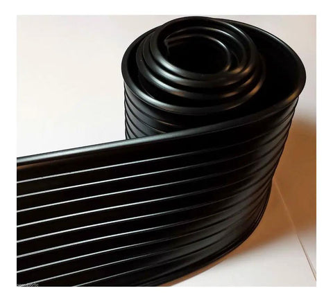 Close-up of coiled black durable foam core garage door bottom weather seal for 16 feet wide doors fits 8000 9000 foam core overhead doors.