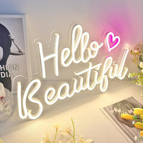 Hello Beautiful Neon Sign For Girl's Room Wall Decor With Dimmer Switch Romantic Neon Light For Weddings Valentine's Day Parties Gifts 12V Warm White With Power Adapter Included illuminated on table next to flowers