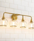 Hot Gold 4 Light Vanity Light Fixture Over Mirror With Clear Glass Globe Shades 30.7 Inch Wall Sconce Bath Lighting