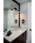 Bramlett Bath And Vanity Light In Nickel Finish With Vintage Industrial Style 8.38W X 24.25H X 24.25D Inches over bathroom sink