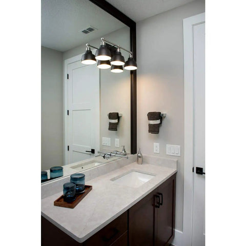 Bramlett Bath And Vanity Light In Nickel Finish With Vintage Industrial Style 8.38W X 24.25H X 24.25D Inches over bathroom sink