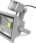 Spot Lighting Led Flood Lights Outdoor Motion Sensor Lm/W Security Lig, Warm White,100W mounted on a wall with motion sensor.