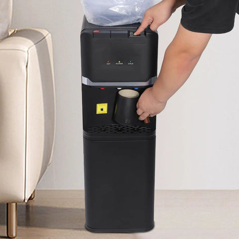 Person using Triple Temperature Water Dispenser With Hot Cold Warm Water Output For Coffee Tea And More Five Gallon Floor Standing Electric Cooler And Heater With Child Lock For Home Office Cafes Black