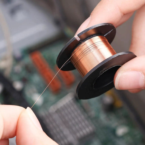 Person unwinding 0.1mm 5Pcs Ultra Thin Soldering Wire Set Copper Jumper Wires For PCB Repair Mobile Phone And Computer Electronics Precision Flexible Link Jump Wires Pro Grade DIY Welding Tools