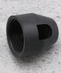 Black hub motor nut for E-Bike Hub Motor Nuts And Safety Washers Set For 750W To 1500W Motors with 14mm Shaft, shown on concrete surface.
