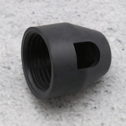 Black hub motor nut for E-Bike Hub Motor Nuts And Safety Washers Set For 750W To 1500W Motors with 14mm Shaft, shown on concrete surface.
