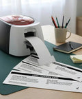 Heavy Duty Ten Pack T Shaped Pre Saturated Cleaning Cards For Magicard And Matica ID Printers on a desk with a printer.