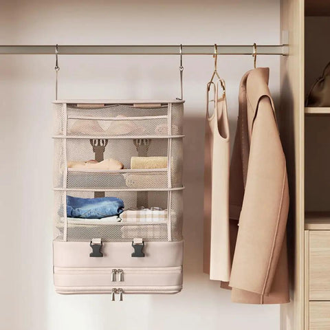 Heavy Duty Hanging Travel Shelf Bag Organizer For Luggage Suitcase With Ventilated Mesh Pockets And Water Repellent Nylon Fabric, hanging on a closet rod.